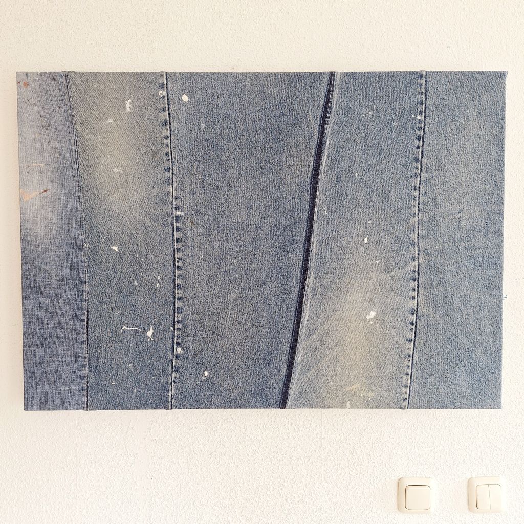 Schilderscanvas van gedragen spijkerbroeken